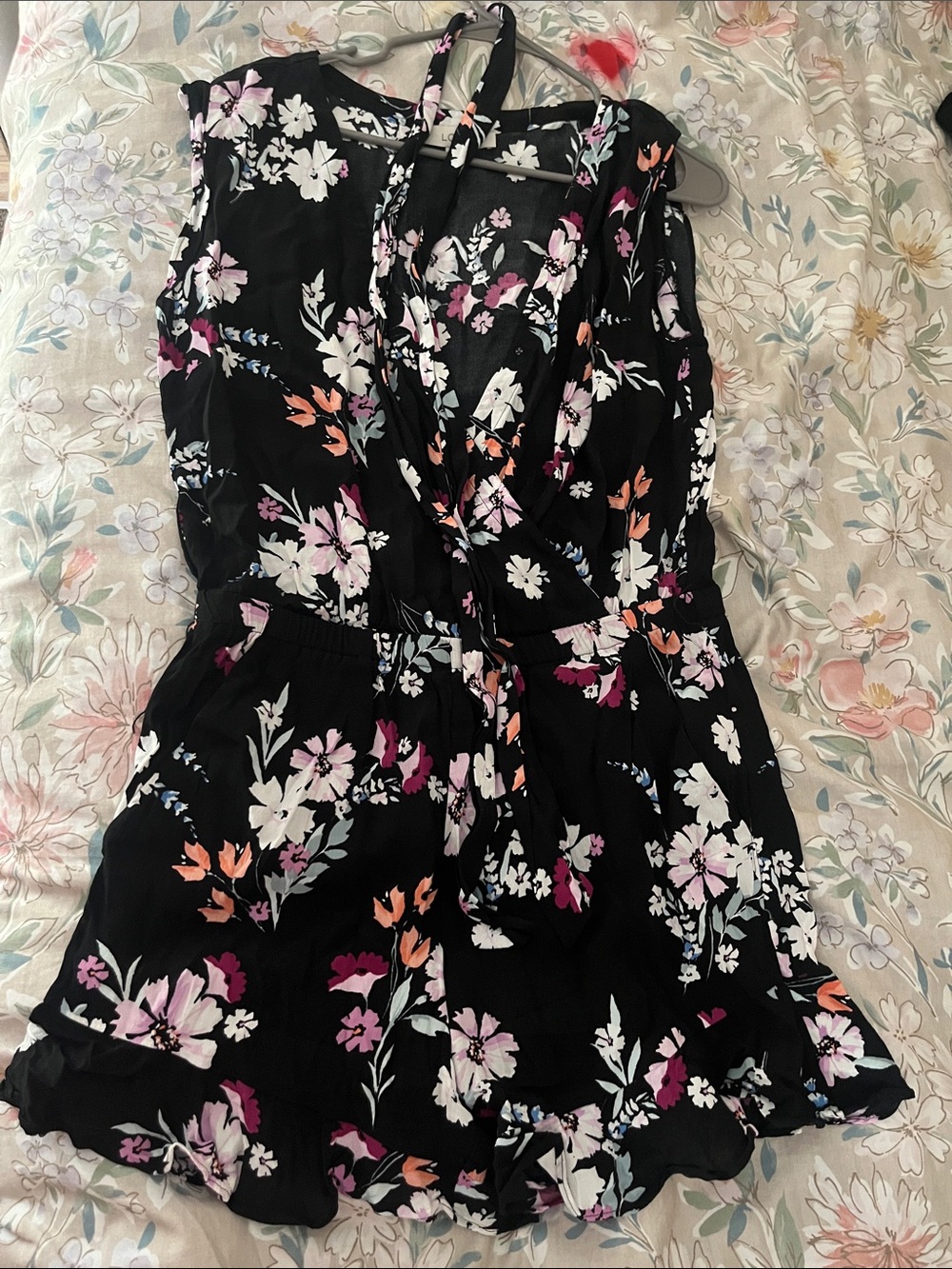 Black Floral Sleeveless Romper with Ruffle Hem